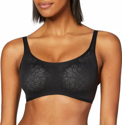 A woman wearing a black bra.
