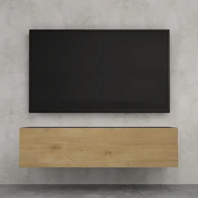 A modern TV lowboard mounted on a concrete wall.