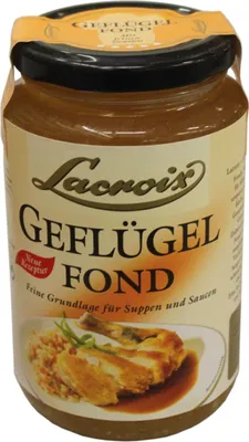 A jar of Lacroix Geflügel Fond on a light beige background.