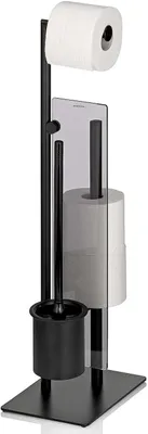 A black toilet brush and toilet paper holder stand with two rolls of toilet paper.