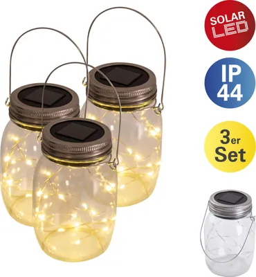 Three solar-powered mason jar lights with fairy lights inside, displayed on a white background with informational icons.