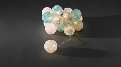 Produktbild von Konstsmide - LED Dekolichterkette, hellblaue/graue/weiße Baumwollkugeln, groß, 16 warm weiße Dioden, 24V Innentrafo, transparentes Kabel