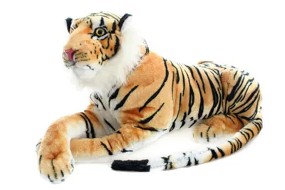 A plush tiger toy lying down on a white background.