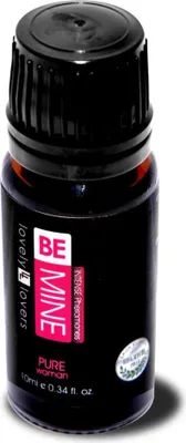 A small dark glass bottle with a black cap, containing a brown liquid. The label is black with pink and white text.