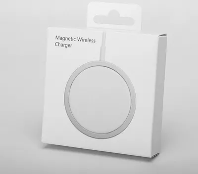 A white box with a circular graphic of a wireless charger on it.