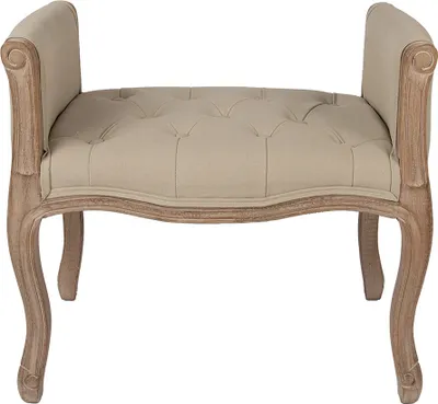 A tufted bench with carved wooden legs and arms.