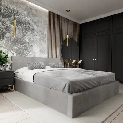 A modern bedroom with a large upholstered bed as the focal point.