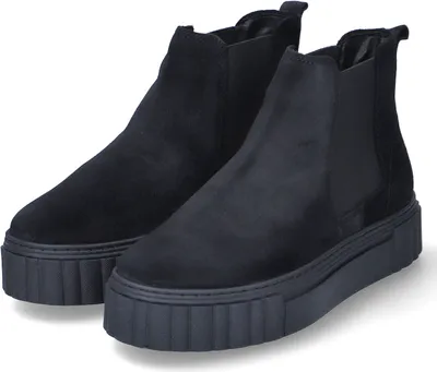 A pair of black Chelsea boots with a thick sole, presented against a white background.