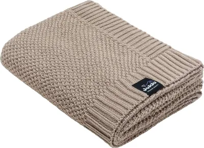 A folded taupe knitted blanket is shown on a white background.