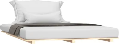 A bed frame with a mattress and pillows on a white background.