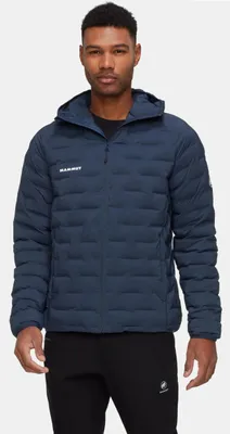 A man wearing a blue hooded jacket.
