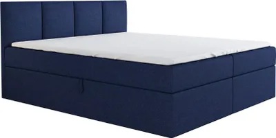 A blue boxspring bed with a white mattress topper is shown against a white background.