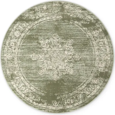 A round rug with a distressed, vintage-inspired pattern.