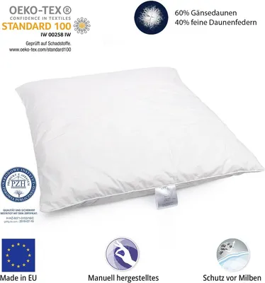 A white pillow is shown on a white background with various certifications and feature callouts.