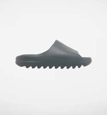 A single slide sandal is shown against a white background.