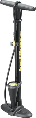 A black and yellow bicycle floor pump with a pressure gauge.