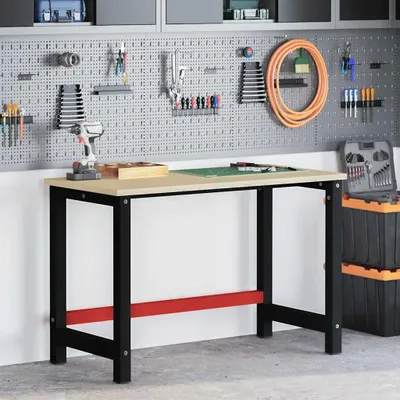 A workbench and pegboard in a garage or workshop setting.