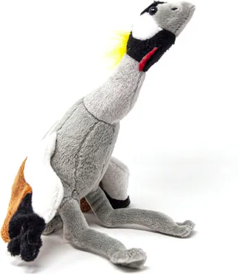 A plush toy crane sits on a white background.