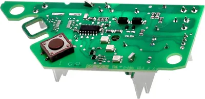A close-up, isolated shot of a green circuit board with various electronic components.