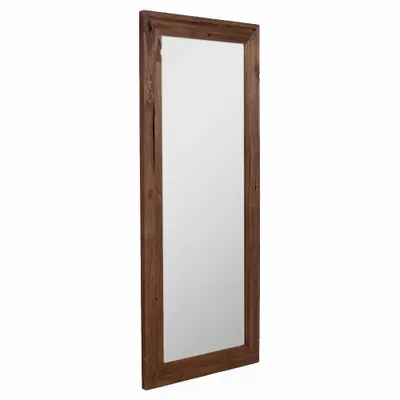 A tall, rectangular mirror with a wooden frame, shown against a white background.