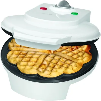 A waffle maker with waffles inside.