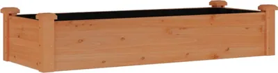 A wooden raised garden bed on a white background.
