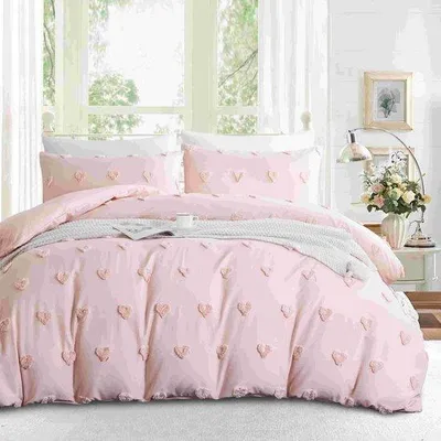 Imagen del producto de Juego de sábanas Unyqoos® de 135x200 cm – Microfibra, 1 funda de edredón + 1 funda de almohada de 80x80 cm, diseño de corazón acolchado, certificado , cierre con cremallera, 4 cintas de sujeción en las esquinas
