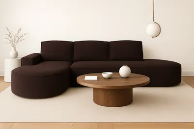 A sectional sofa in a minimalist living room setting.