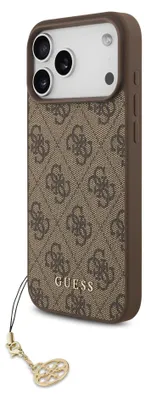 A close-up, angled view of a brown Guess branded iPhone case with a gold charm attached.