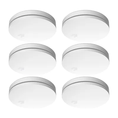 Six white, round smoke detectors are arranged in two columns and three rows on a white background.