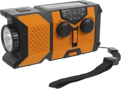 Immagine prodotto di Caricabatterie manuale con torcia LED multifunzionale e radio per il campeggio e le emergenze.