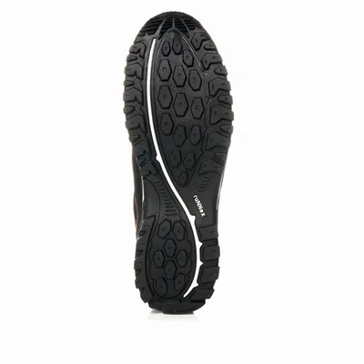The underside of a black shoe is shown against a white background.