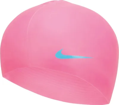 A pink Nike swim cap with a blue Nike logo.