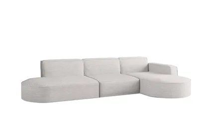 A light-colored sectional sofa with a chaise lounge on a white background.