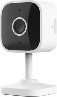A white indoor IP camera on a white stand against a white background.