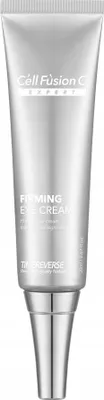 A silver tube of eye cream against a white background.