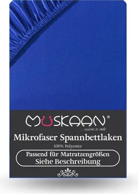 A close-up of a blue fitted sheet, with branding and product information visible on a dark label.