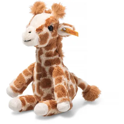 A plush toy giraffe sitting on a white background.