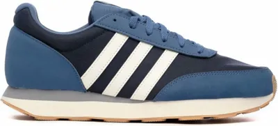 A side view of a blue Adidas sneaker against a white background.