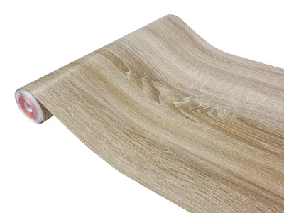 A roll of wood-grain contact paper or wallpaper.