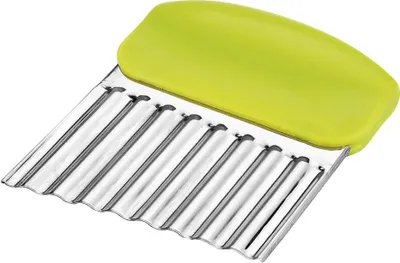 A wavy-edged cutter with a green handle.