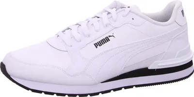 A white Puma sneaker with black accents is shown from the side against a white background.