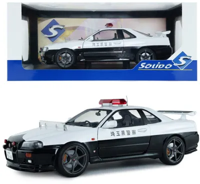 Immagine prodotto di Modello solido 421186618 - Nissan Skyline 1999, scala 1:18, Polizia giapponese - Nuovo