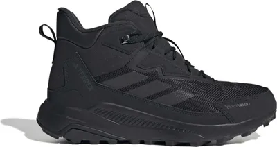 A studio shot of a black Adidas Terrex hiking boot.