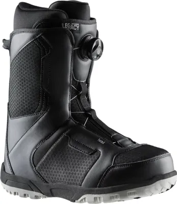 A single black snowboard boot is shown against a white background.