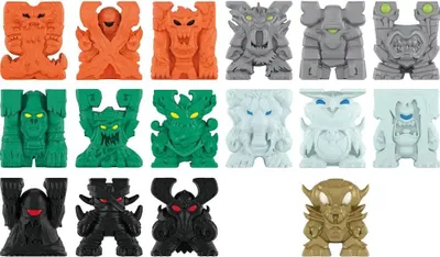 A collection of small, stylized monster figures in various colors and designs.