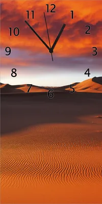 Produktbild von Wallario Design Wanduhr Sahara Wüste II - Sanddünen im Sonnenuntergang aus Echtglas, Größe 30 x 60 cm