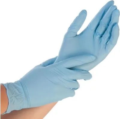 A person putting on a blue disposable glove.