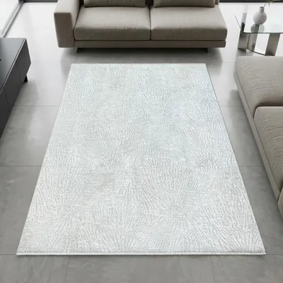 Productafbeelding van Robuust vloerkleed in crème kleur met een modern lijnpatroon en franjes. Afmetingen: 200 x 290 cm