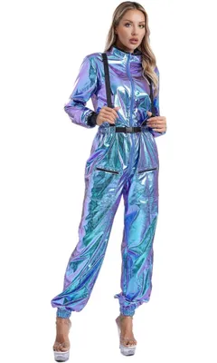 A woman is modeling a metallic jumpsuit with suspenders.